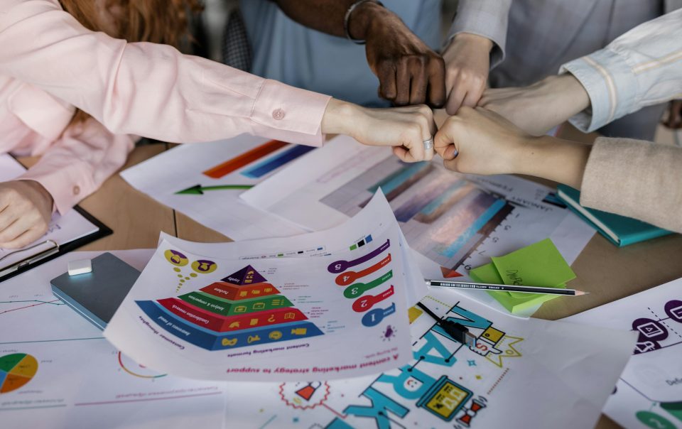 People with Hands Together