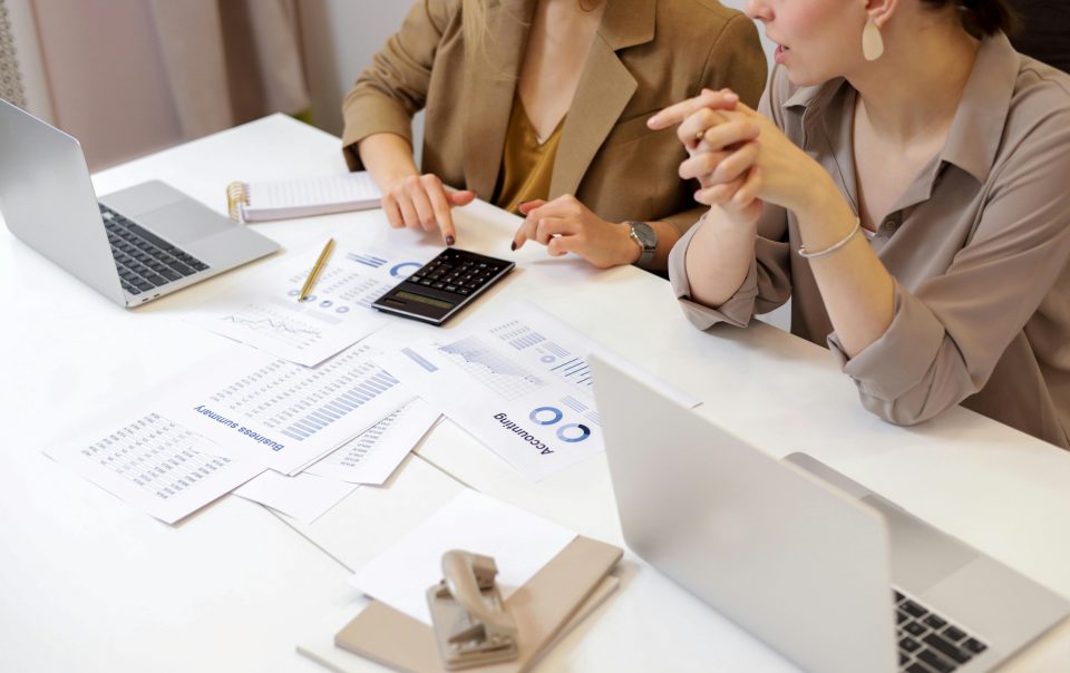 Two Women Doing Accounting Work
