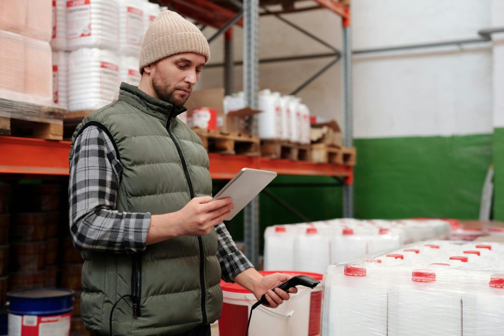 Man Checking Inventory of Construction Materials