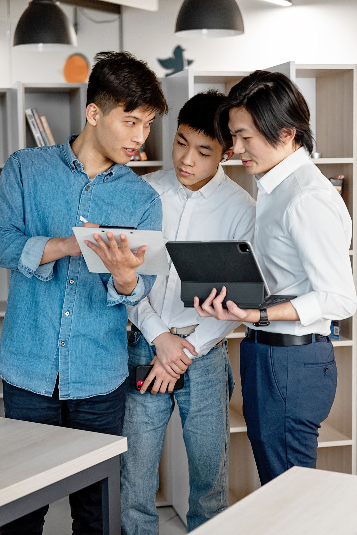 Rockbell consultants reviewing figures on a tablet